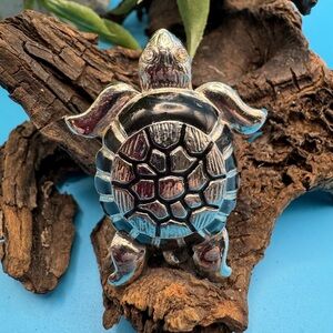 Silver tone & black enamel turtle brooch, EUC. Rhinestone eyes.